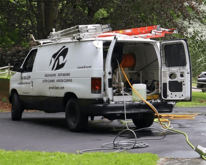 Cleveland Power Washing professionals cleaning commercial fleet in Cleveland